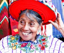 Kvinna med röd hatt, Guatemala